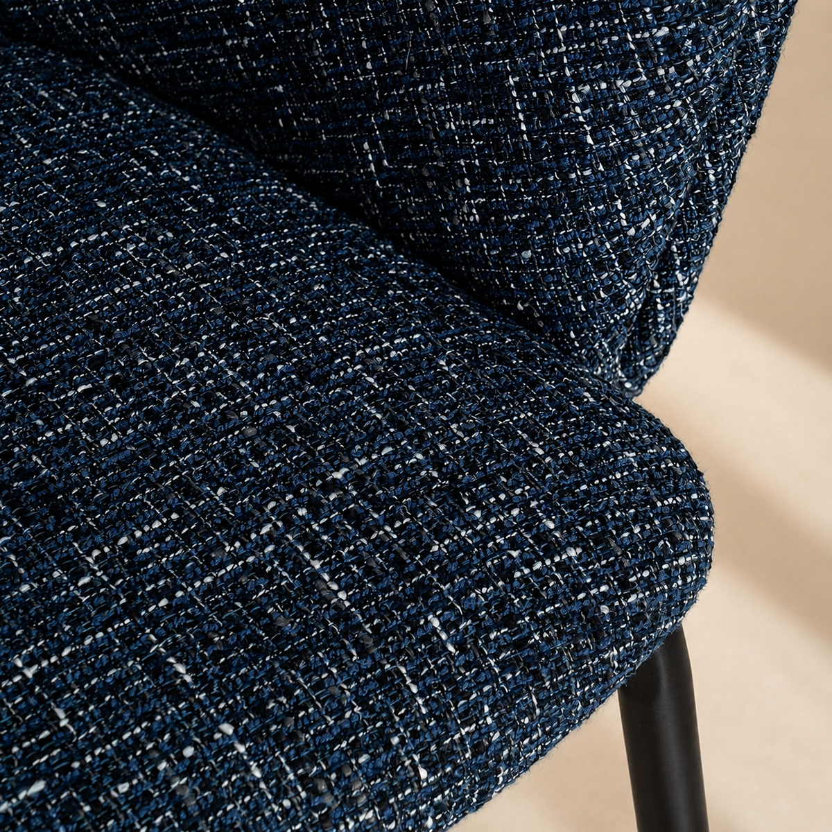 Upholstered dining chair with armrests, metal legs