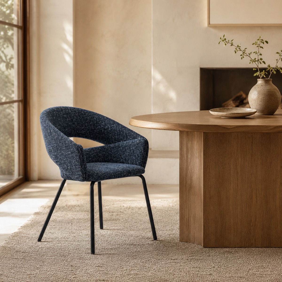 Upholstered dining chair with armrests, metal legs