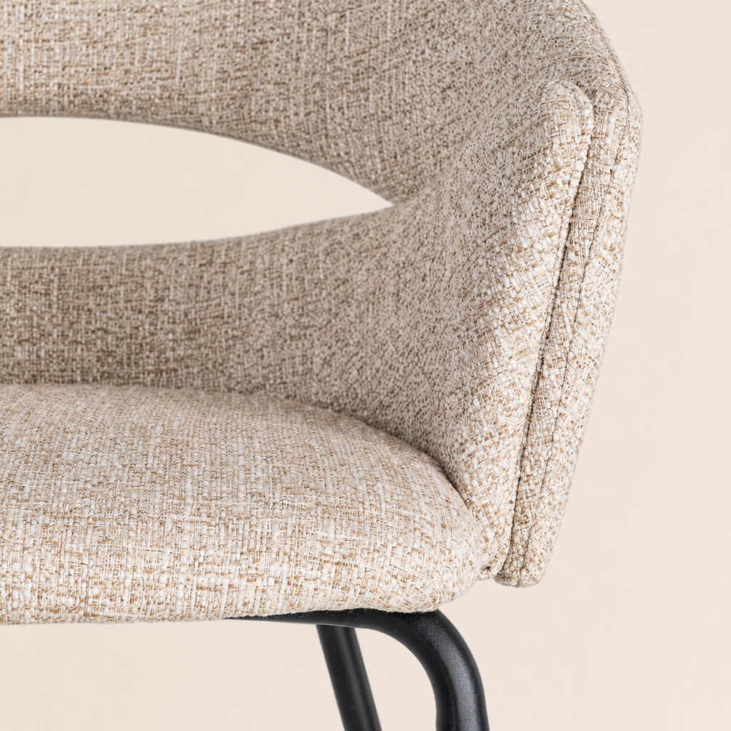 Upholstered dining chair with armrests, metal legs