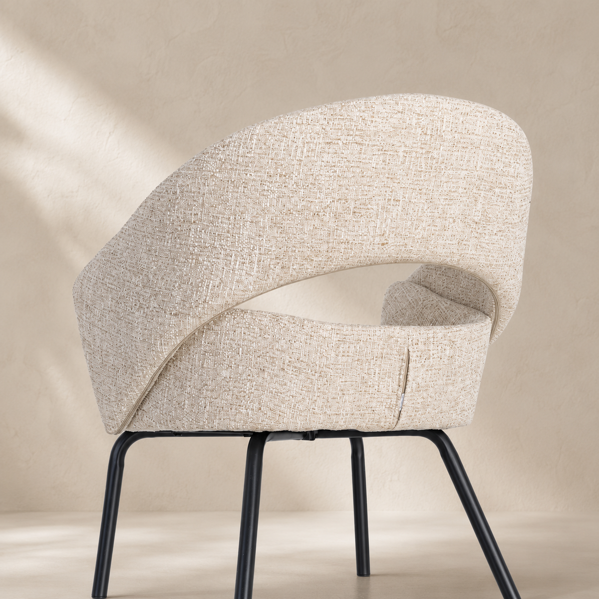 Upholstered dining chair with armrests, metal legs