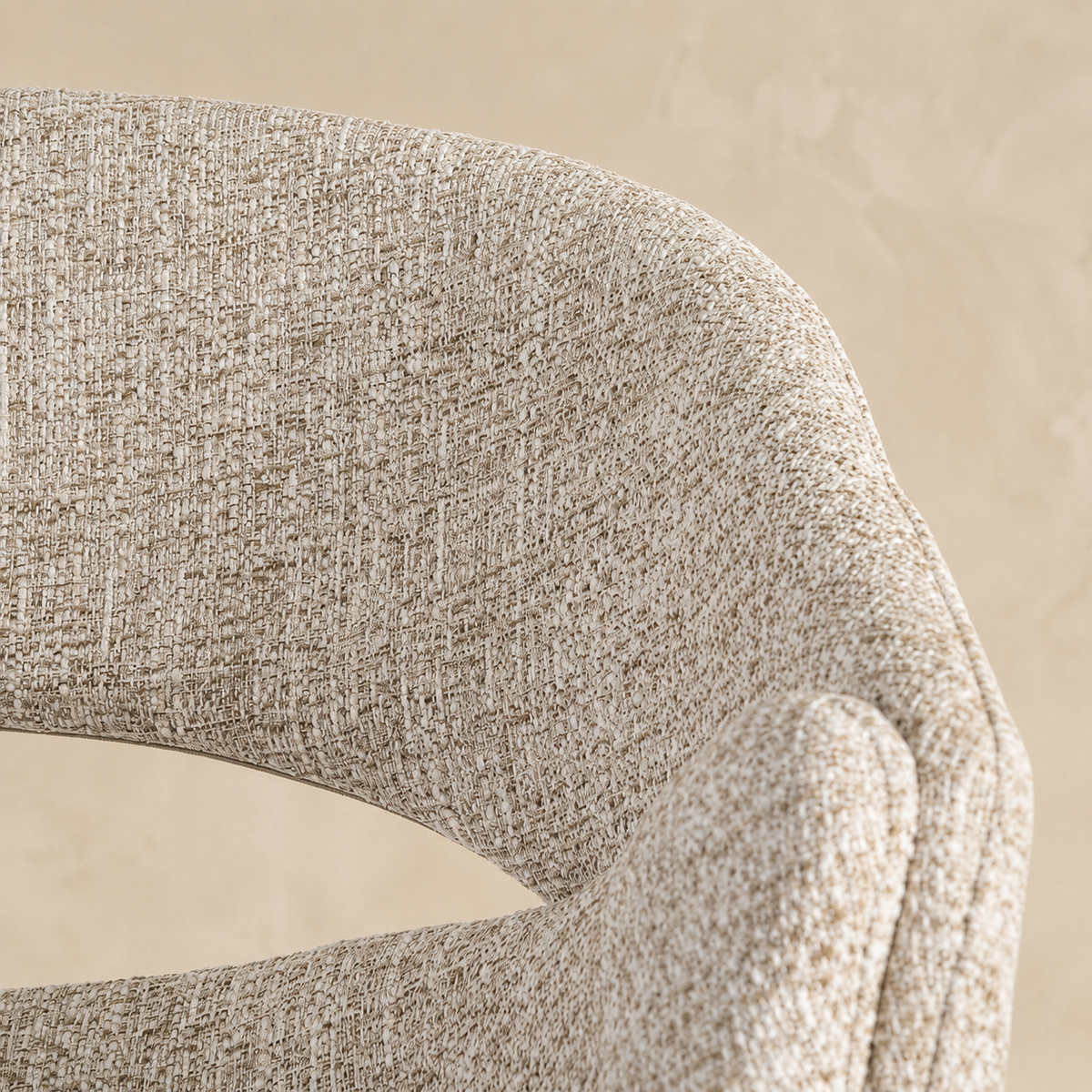 Upholstered dining chair with armrests, metal legs