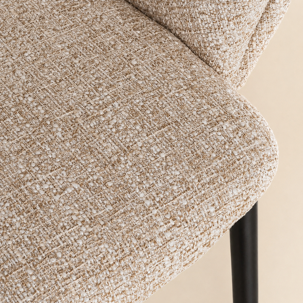 Upholstered dining chair with armrests, metal legs