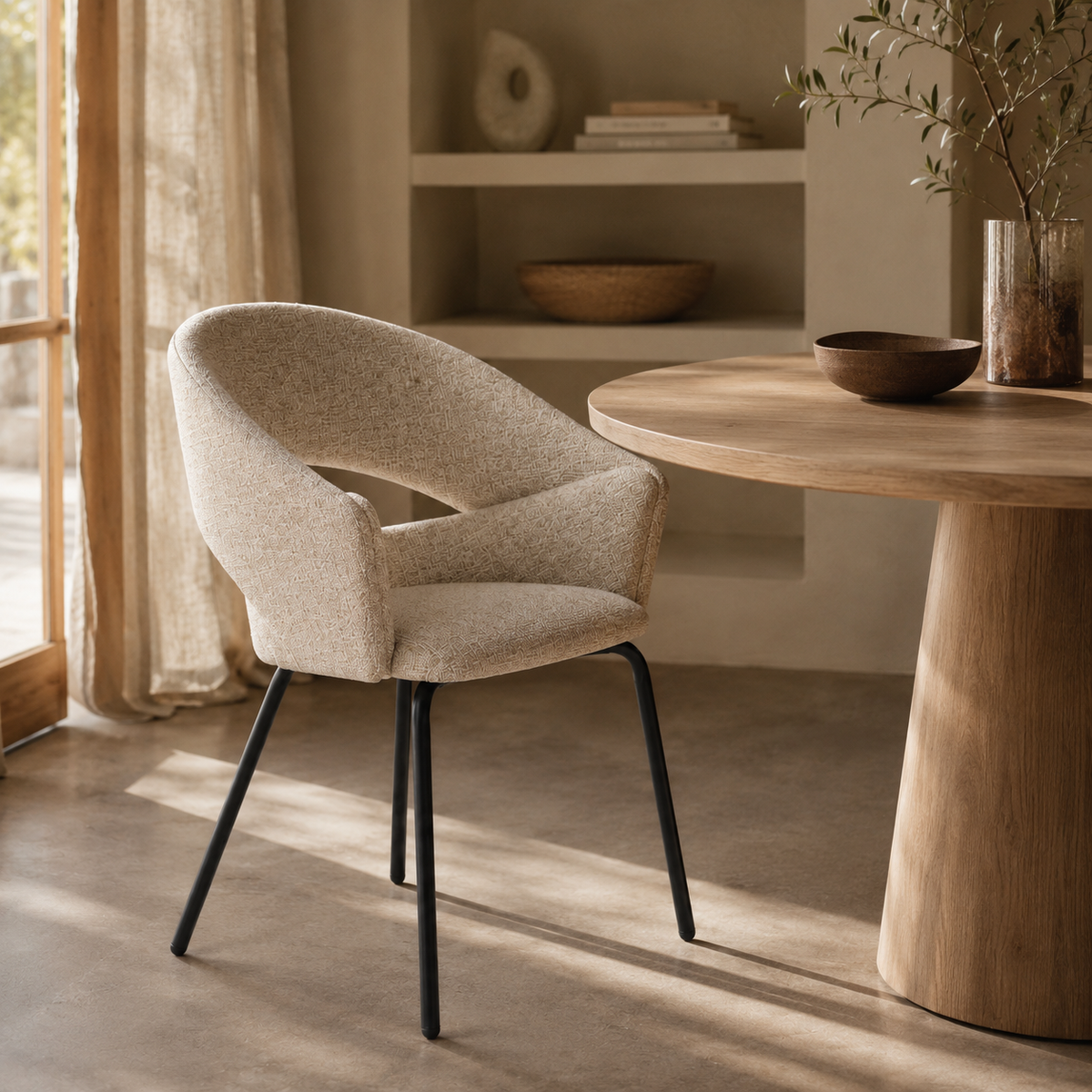 Upholstered dining chair with armrests, metal legs