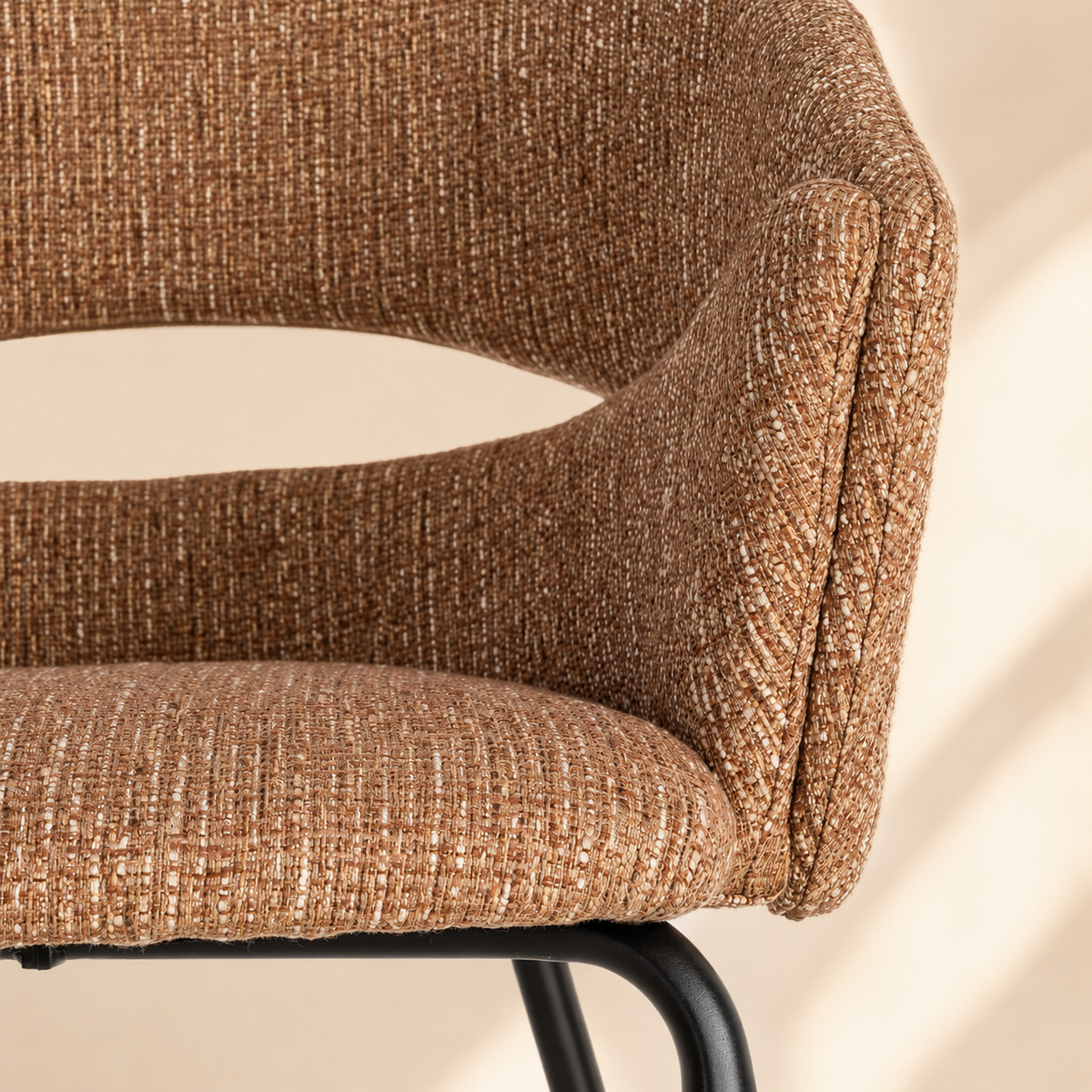 Upholstered dining chair with armrests, metal legs