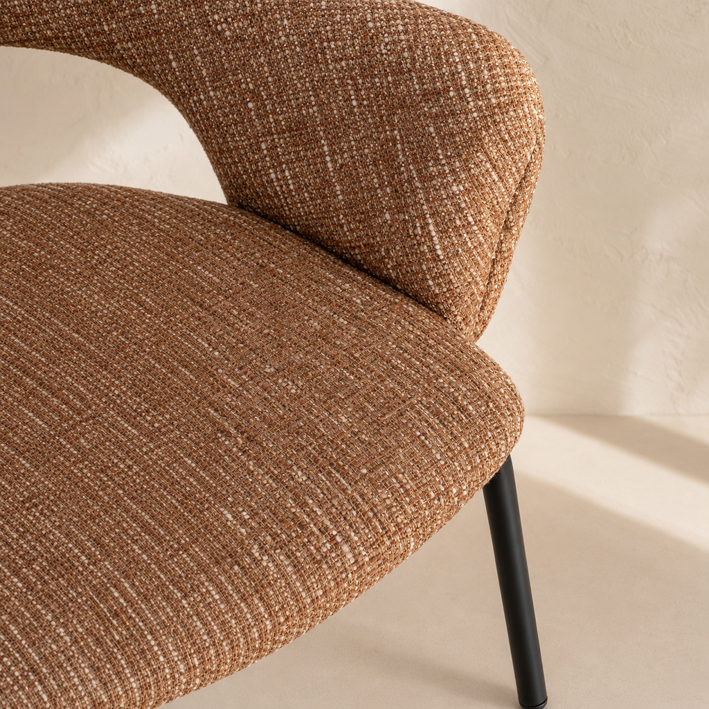 Upholstered dining chair with armrests, metal legs