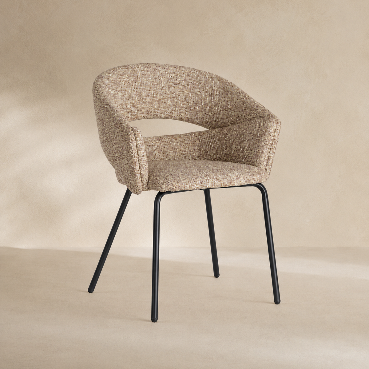 Upholstered dining chair with armrests, metal legs