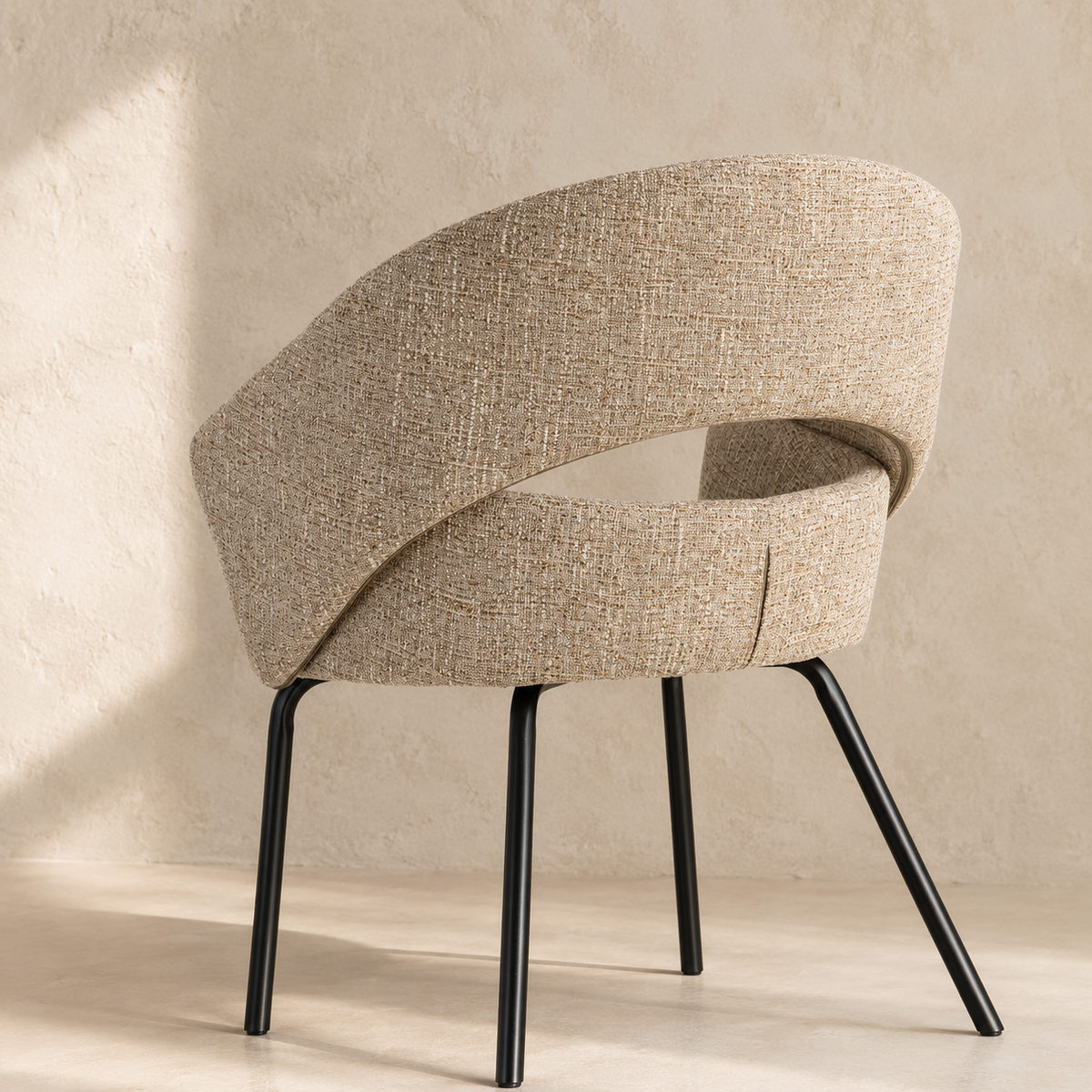 Upholstered dining chair with armrests, metal legs