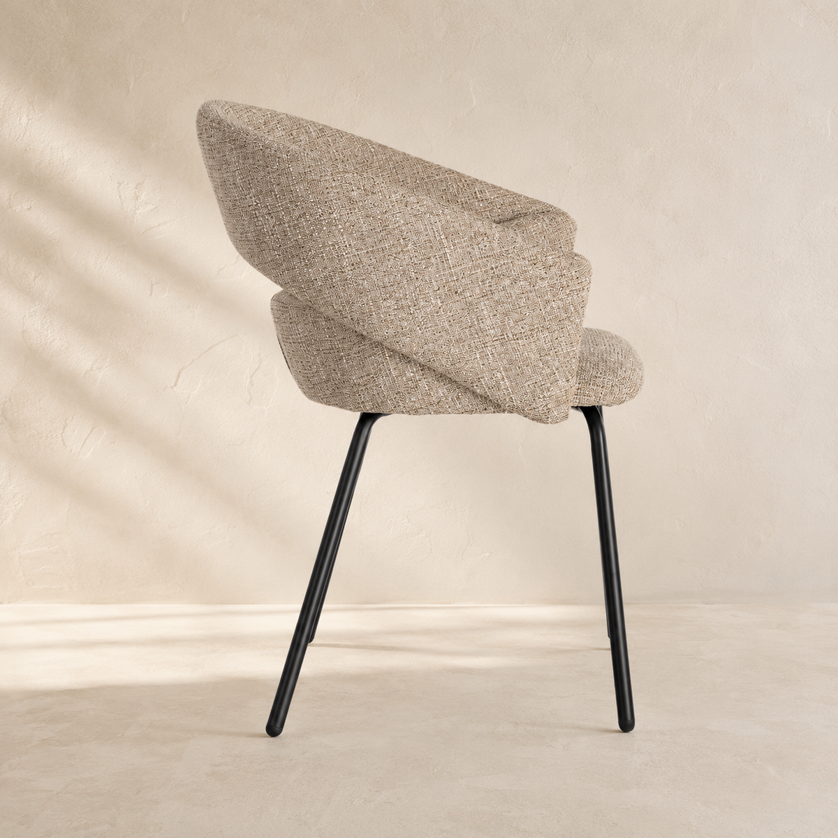 Upholstered dining chair with armrests, metal legs