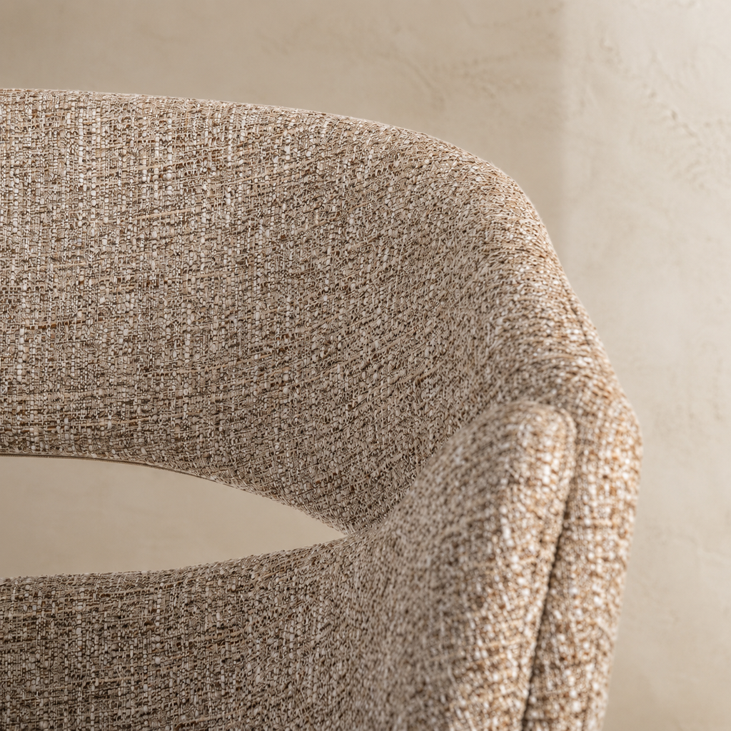 Upholstered dining chair with armrests, metal legs
