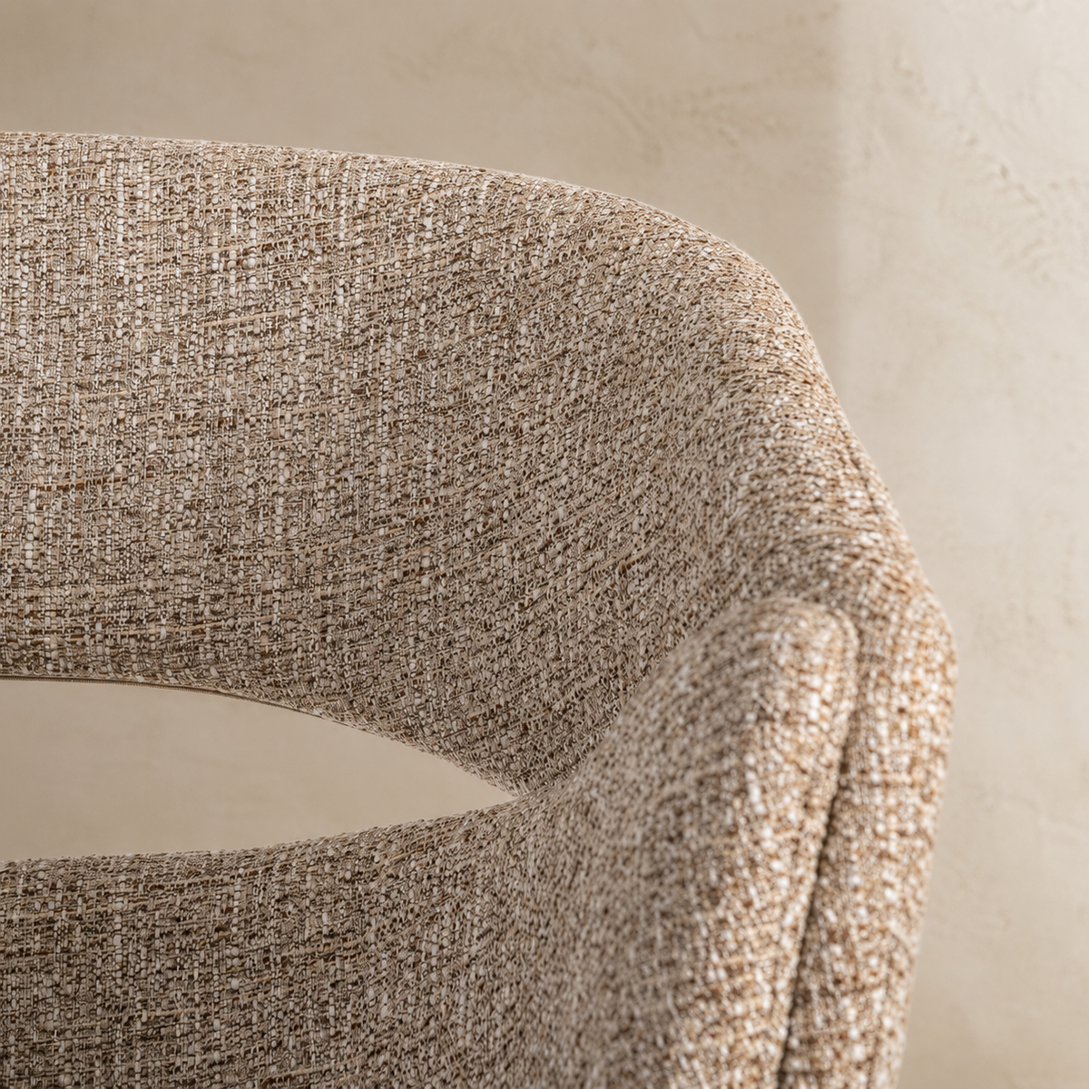 Upholstered dining chair with armrests, metal legs