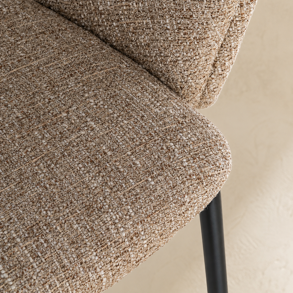 Upholstered dining chair with armrests, metal legs