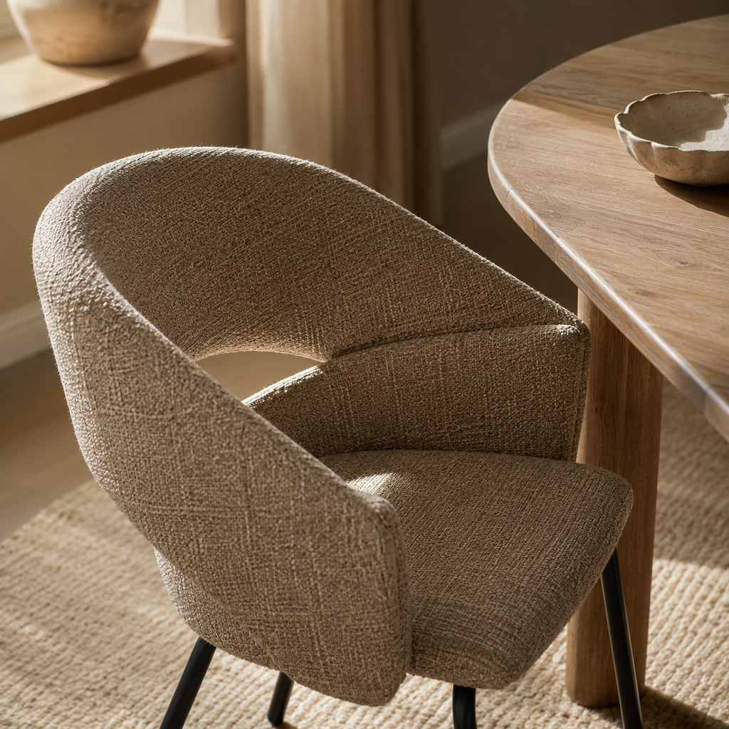 Upholstered dining chair with armrests, metal legs