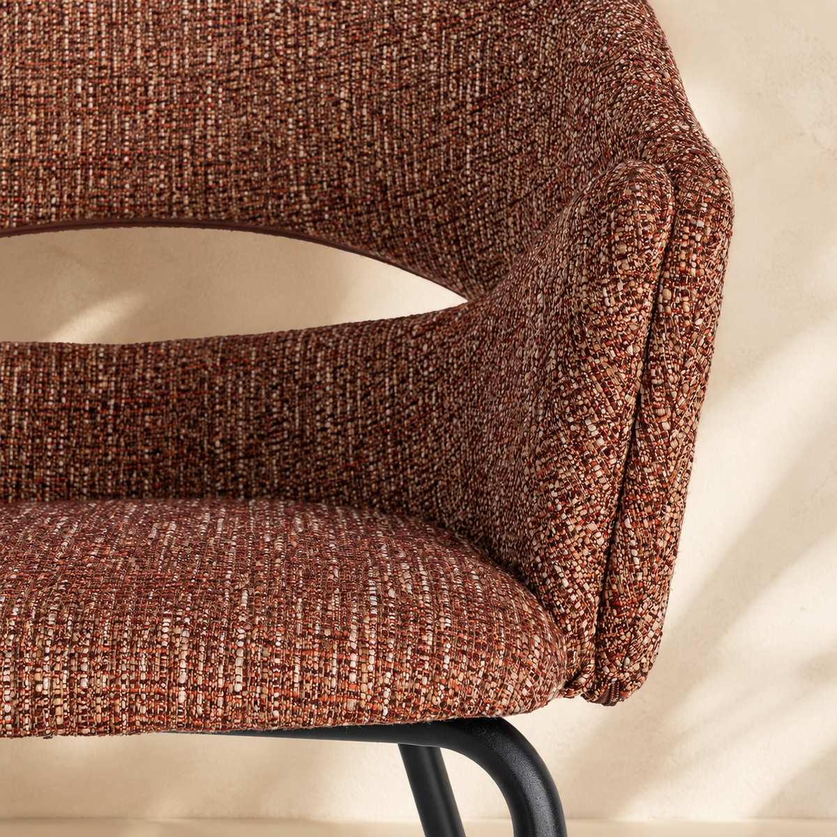 Upholstered dining chair with armrests, metal legs