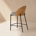 Upholstered low stool with backrest